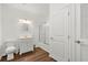 Bathroom featuring a shower, vanity, toilet, with stylish wood look flooring at 2436 Camden Lake Nw Vw, Acworth, GA 30101