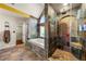 Beautiful bathroom with a walk-in shower and a soaking tub under a window, providing a serene retreat at 2436 Camden Lake Nw Vw, Acworth, GA 30101