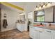 Bathroom featuring and sinks, tile floors and arched windows at 2436 Camden Lake Nw Vw, Acworth, GA 30101