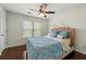 Cozy bedroom with beautiful natural light, hardwood floors and a comfortable bed at 2436 Camden Lake Nw Vw, Acworth, GA 30101