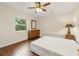 Bright bedroom with hardwood floors and a window, providing a cozy and inviting atmosphere at 2436 Camden Lake Nw Vw, Acworth, GA 30101