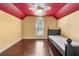 Bedroom featuring a ceiling fan, hardwood floors, and a bed frame at 2436 Camden Lake Nw Vw, Acworth, GA 30101