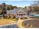 Community clubhouse featuring a brick exterior, columns, and manicured landscaping at 2436 Camden Lake Nw Vw, Acworth, GA 30101
