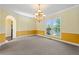 Bright dining room has chandelier and beautiful lake view at 2436 Camden Lake Nw Vw, Acworth, GA 30101