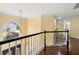 Bright foyer showcasing hardwood floors, a decorative chandelier and an arched window at 2436 Camden Lake Nw Vw, Acworth, GA 30101