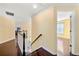 Second floor hallway with hardwood floors at 2436 Camden Lake Nw Vw, Acworth, GA 30101
