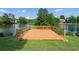 Outdoor deck that overlooks the lake with a grassy yard at 2436 Camden Lake Nw Vw, Acworth, GA 30101