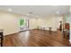 Open living area featuring hardwood floors, a walkout, and natural light at 2436 Camden Lake Nw Vw, Acworth, GA 30101