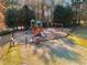 Community playground area with slides and swings in fenced in area at 2436 Camden Lake Nw Vw, Acworth, GA 30101