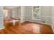 Bright living room featuring beautiful hardwood floors, neutral paint and trim, and natural light at 3743 Tree Bark Trl, Decatur, GA 30034