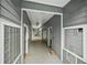 Well-lit interior hallway with mailboxes and apartment entrances, providing convenient access at 7104 Santa Fe Pkwy, Atlanta, GA 30350