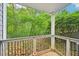 Secluded backyard patio overlooking lush wooded area at 7104 Santa Fe Pkwy, Atlanta, GA 30350