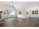 Spacious living room with large windows, high ceilings, and hardwood floors at 150 Doris Path, Dallas, GA 30157