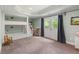 Spacious bedroom featuring custom bunk beds, French doors, and ample play area for children at 4825 Brighton Lake Dr, Cumming, GA 30040