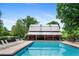 Community pool with a covered picnic area nearby, perfect for enjoying outdoor fun and relaxation at 4825 Brighton Lake Dr, Cumming, GA 30040
