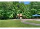Community recreation area featuring a playground, picnic shelter, and lush greenery, designed for outdoor enjoyment at 4825 Brighton Lake Dr, Cumming, GA 30040