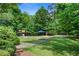 Recreation area featuring a playground and a volleyball court, offering diverse activities for residents at 4825 Brighton Lake Dr, Cumming, GA 30040