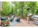 Inviting back deck with comfortable seating and a grill, perfect for entertaining at 3157 Sawyer Ne Ct, Marietta, GA 30066