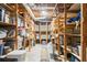 Unfinished basement featuring open shelves for storage and exposed ductwork at 3157 Sawyer Ne Ct, Marietta, GA 30066