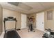 Finished basement with fitness equipment including a treadmill and exercise bike at 3157 Sawyer Ne Ct, Marietta, GA 30066