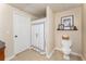 Small bathroom features a toilet, patterned shower curtain, and a small shelf at 3157 Sawyer Ne Ct, Marietta, GA 30066