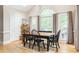 Bright dining room with large window, hardwood floors, and traditional style table at 3157 Sawyer Ne Ct, Marietta, GA 30066