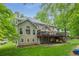 Well-maintained home exterior with a spacious deck overlooking the beautiful backyard at 3157 Sawyer Ne Ct, Marietta, GA 30066