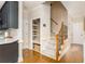 Hallway featuring a staircase, hardwood flooring and a charming storage nook at 3157 Sawyer Ne Ct, Marietta, GA 30066
