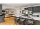Open kitchen features stainless steel appliances, modern countertops, and dark cabinetry at 3157 Sawyer Ne Ct, Marietta, GA 30066