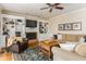 Cozy living room features built-in bookshelves, fireplace, hardwood floors, and neutral-toned furniture at 3157 Sawyer Ne Ct, Marietta, GA 30066