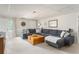Bright living room featuring a sectional sofa and a wooden chest coffee table at 3157 Sawyer Ne Ct, Marietta, GA 30066