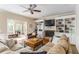 Inviting living room featuring a fireplace, built-in shelving, and comfortable seating for relaxing at home at 3157 Sawyer Ne Ct, Marietta, GA 30066