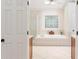 Ensuite bathroom featuring soaking tub, glass shower, and tile floor at 3157 Sawyer Ne Ct, Marietta, GA 30066