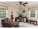 Cozy office with a large window and an eclectic chair and ottoman at 3157 Sawyer Ne Ct, Marietta, GA 30066