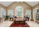 Bright sunroom featuring high ceilings, large windows, and ample space for relaxing and enjoying the natural light at 3157 Sawyer Ne Ct, Marietta, GA 30066