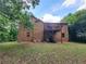 This backyard features a deck and patio furniture at 3723 Raiders Ridge Dr, Lithonia, GA 30038