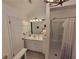 Bathroom with vanity, mirror, lighting, and walk-in shower at 3723 Raiders Ridge Dr, Lithonia, GA 30038