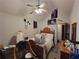 Comfortable bedroom with bed, ceiling fan, and natural light at 3723 Raiders Ridge Dr, Lithonia, GA 30038