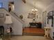 Home entryway with high ceilings, wood and carpet floors, and staircase to the second floor at 3723 Raiders Ridge Dr, Lithonia, GA 30038