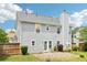 Home's backyard featuring a patio and partial fence at 5512 Village Rdg, Fairburn, GA 30213