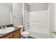 Bathroom featuring a sink, toilet, and shower at 5512 Village Rdg, Fairburn, GA 30213
