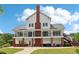 Spacious clubhouse with balconies and brick support columns, ideal for events at 5512 Village Rdg, Fairburn, GA 30213