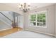 Inviting dining room with a large window allowing for lots of natural light at 5512 Village Rdg, Fairburn, GA 30213