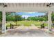 Scenic view from inside the gazebo showcasing the expansive community green space at 5512 Village Rdg, Fairburn, GA 30213