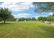 Expansive green space, perfect for picnics and recreation, features mature trees at 5512 Village Rdg, Fairburn, GA 30213