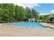 Relaxing community pool with lounge chairs, ideal for soaking up the sun at 5512 Village Rdg, Fairburn, GA 30213