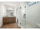 Bathroom featuring a double vanity with stone countertop and a large glass shower at 160 Doris Path, Dallas, GA 30157