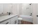 Modern bathroom featuring granite countertops, white subway tile and bathtub at 160 Doris Path, Dallas, GA 30157