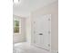 Light-filled bedroom featuring a large window and closet at 160 Doris Path, Dallas, GA 30157