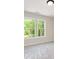 Sun-lit bedroom featuring a large window with lush green views at 160 Doris Path, Dallas, GA 30157